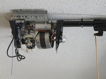 Opened garage door opener motor housing during a diagnostic inspection in Sacramento