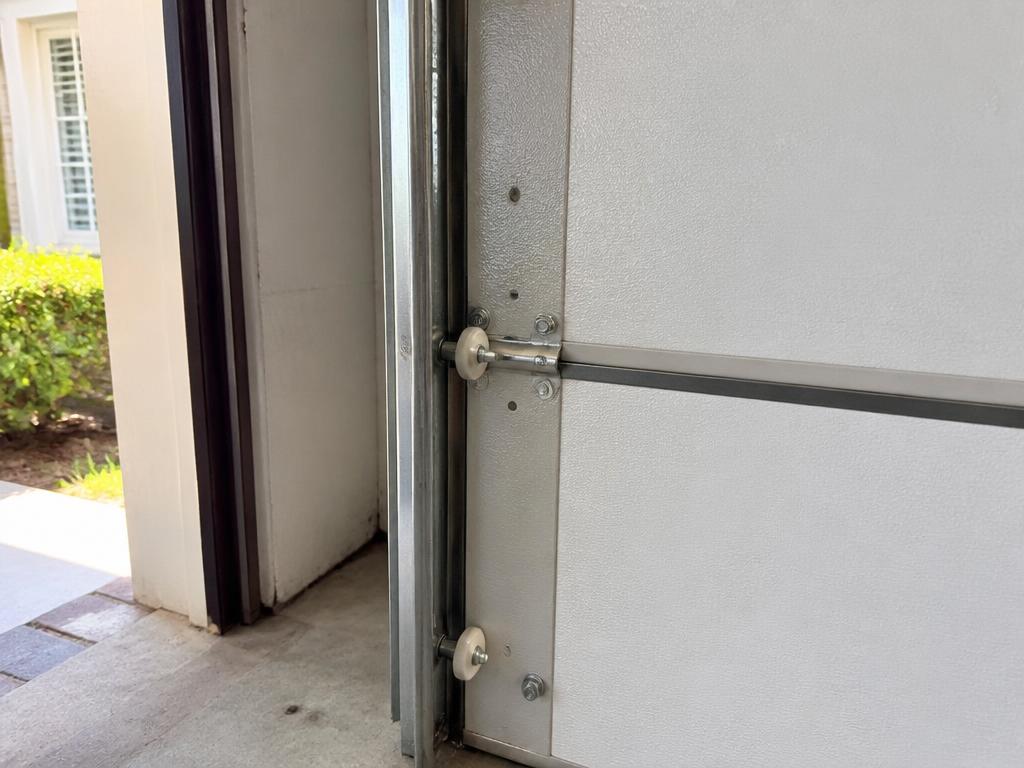 After: completed roller & maintenance tune-up by A&M Garage Door & Gate Service in Sacramento